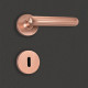 Poignée de porte design à clé finition aspect or rose livia - katchmee 